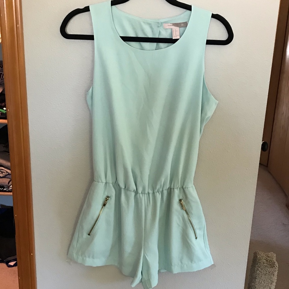 Mint romper with gold zipper pickets & wrap back